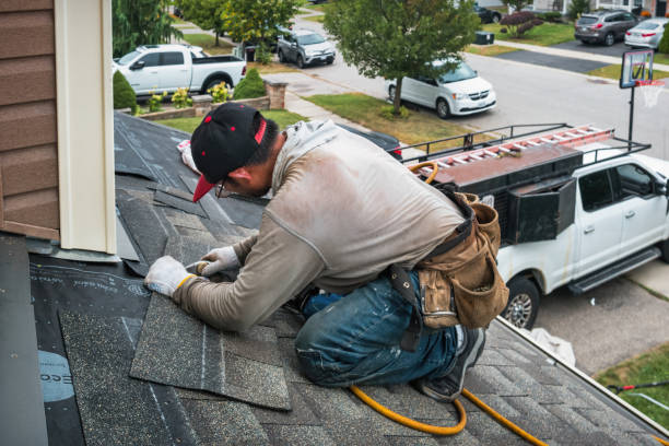 Professional Roofing technician working in St. James, MD